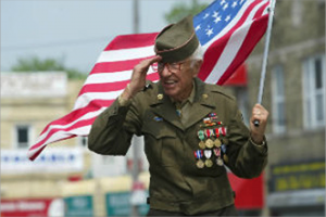 Veteran Holding Flag