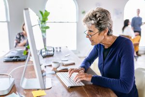 Woman on Computer Resources Resized